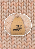 Petite Wool Skylovers yarn ball on a matching knit swatch
