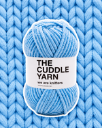 The Cuddle Yarn Blue chenille skein on a matching knit swatch