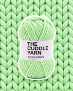 The Cuddle Yarn Green chenille skein on a matching knit swatch